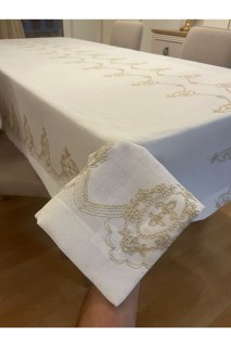 Tischdecke ohne Bügeln mit goldglänzender Stickerei in gebrochenem Weiß